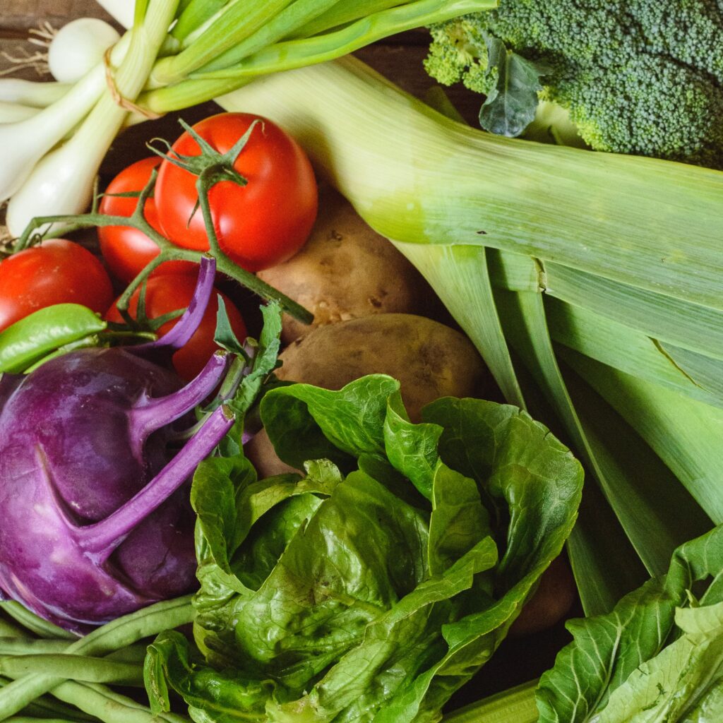 organic veg box - lettuce, leeks and tomato